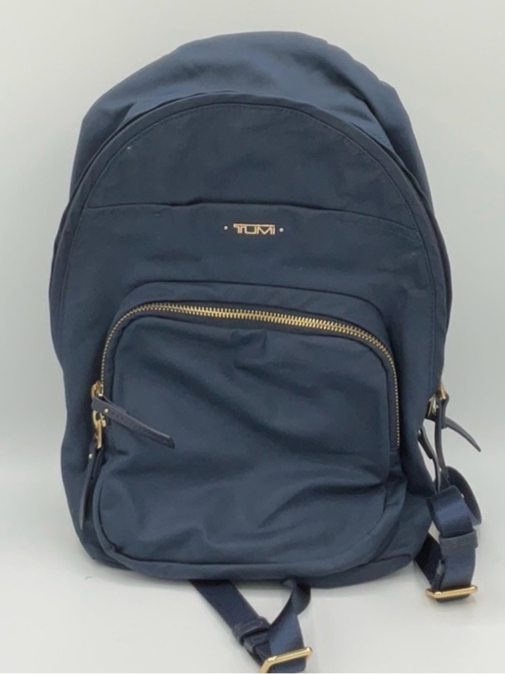 Tumi Navy Backpack with Gold Hardware